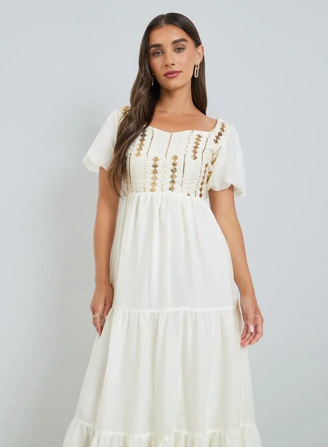 Styli Women Beige Embroidered Puff Sleeves Tiered Maxi Dress